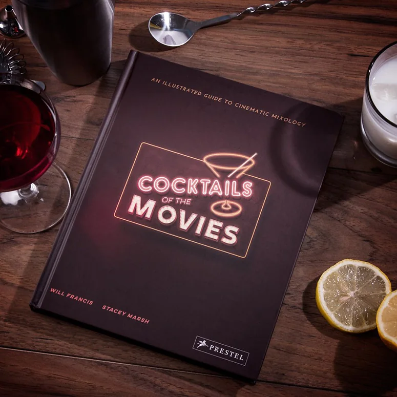 Cocktails of the Movies by Will Francis and Stacey Marsh, on a table with drinks and cocktail equipment