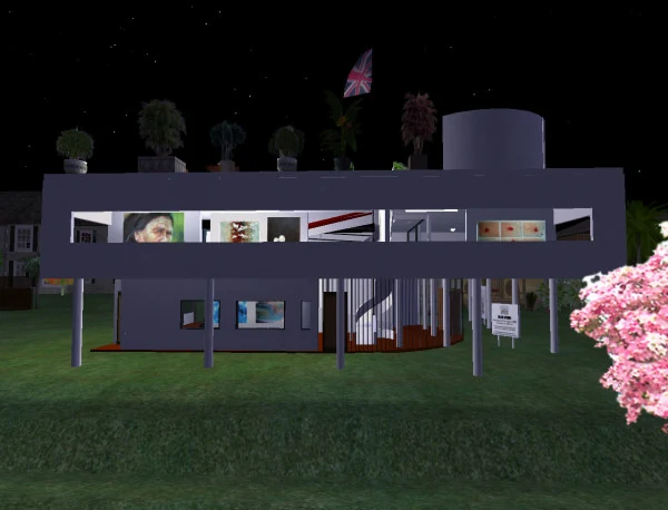 The arts centre Will built in Second Life, with artworks displayed inside a white modernist building