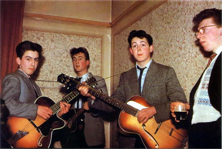 Historical photograph of young musicians with guitars, reproduced in the Beatles article.