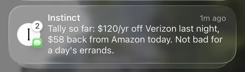 An Instinct notification reporting a lower Verizon bill and money back from Amazon