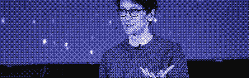 Will Francis speaking on stage