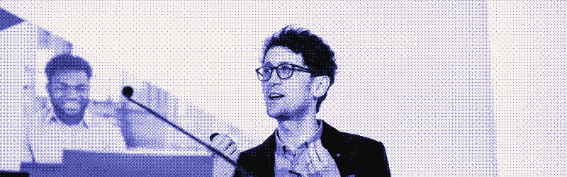 Will Francis speaking at a keynote